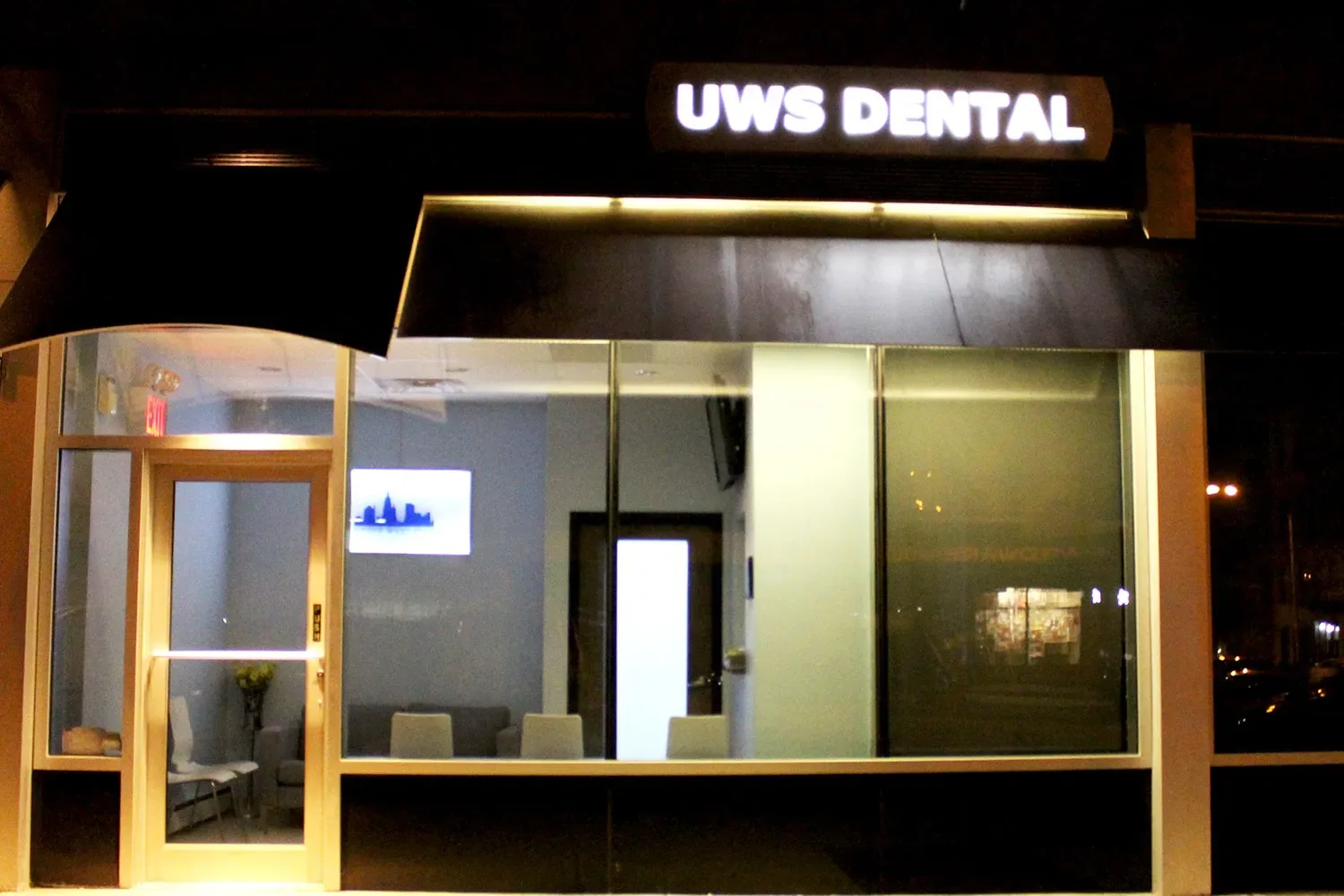 Upper West Side Dental storefront in the evening